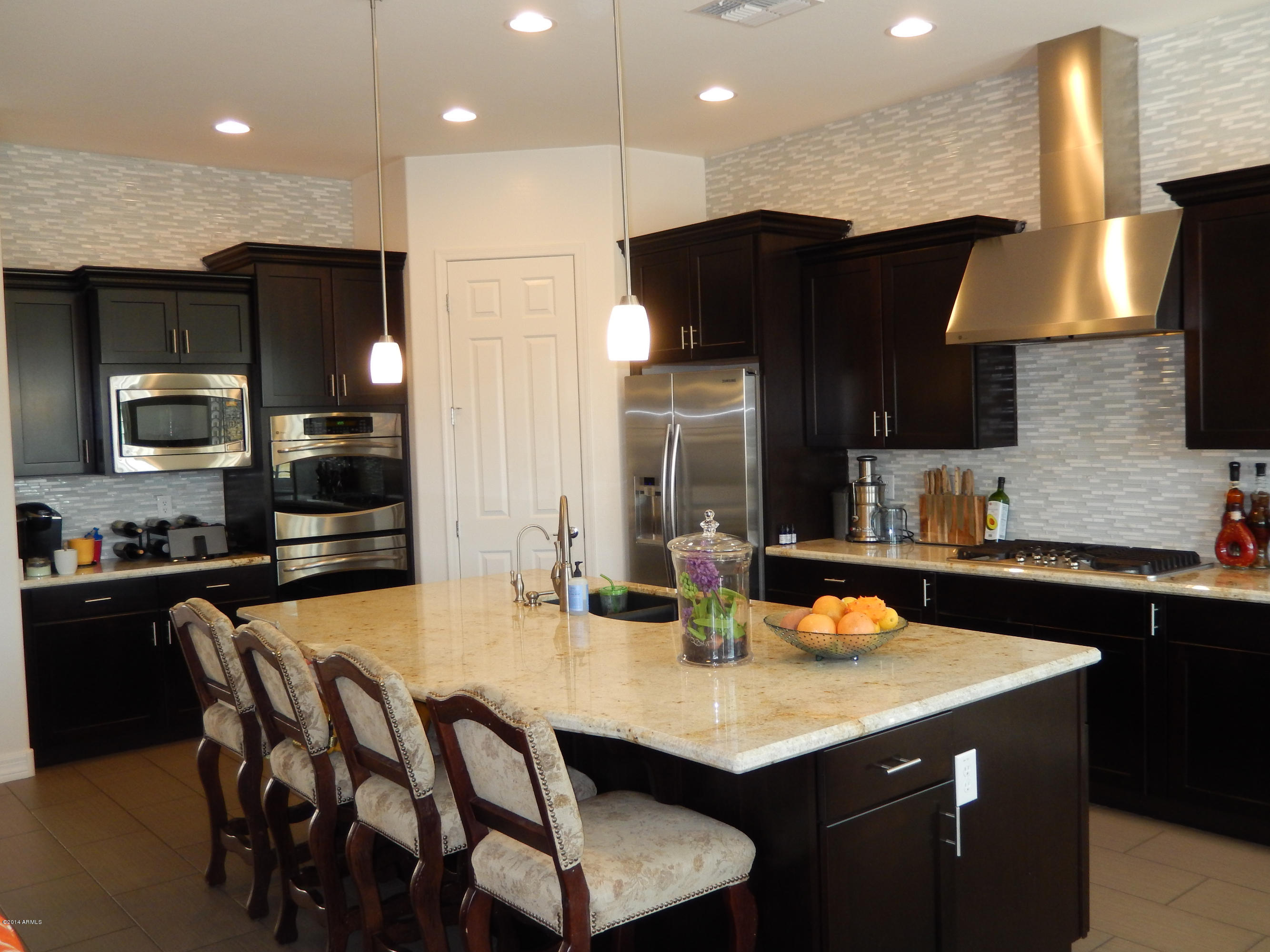 16079 West Coronado Road Goodyear, AZ 85395 - Photo 8 of 32 KITCHEN-GRANITE COUNTERTOPS-BRKFST BAR
