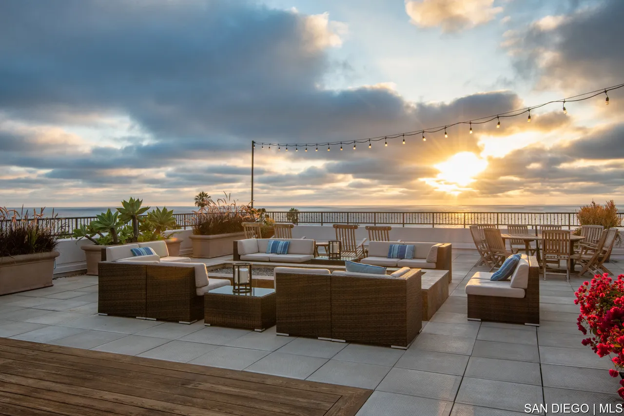 464 Prospect Street, Unit PH5 La Jolla, CA 92037 - Photo 17 of 28 a view of a roof deck with couches and potted plants