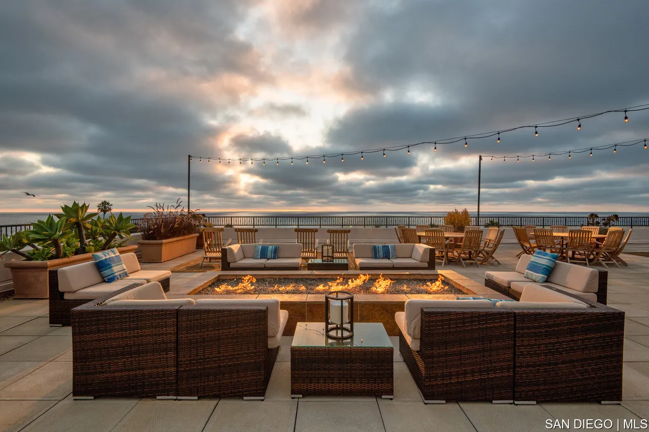 464 Prospect Street, Unit PH5 La Jolla, CA 92037 - Photo 19 of 28 a outdoor space with lots of couches and potted plants