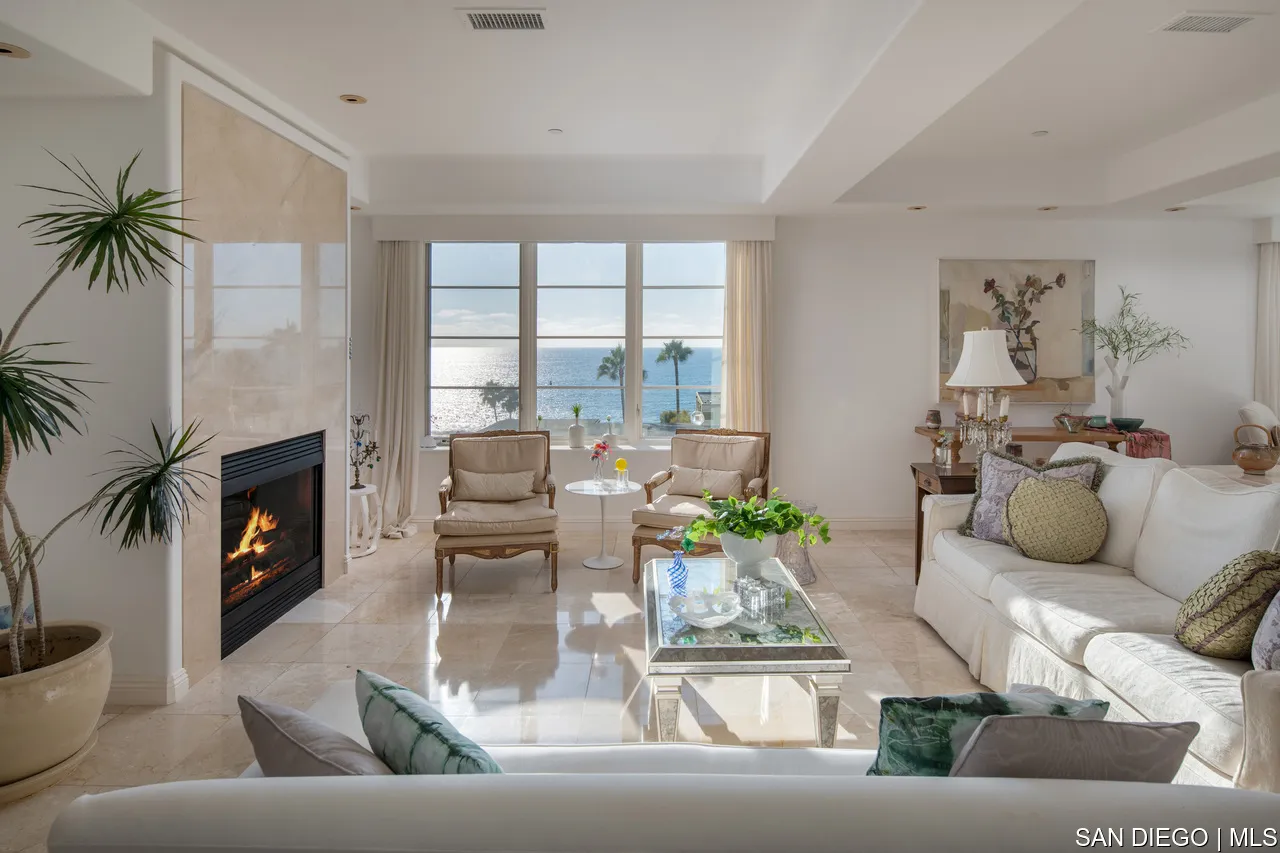 464 Prospect Street, Unit PH5 La Jolla, CA 92037 - Photo 4 of 28 a living room with furniture and a fireplace