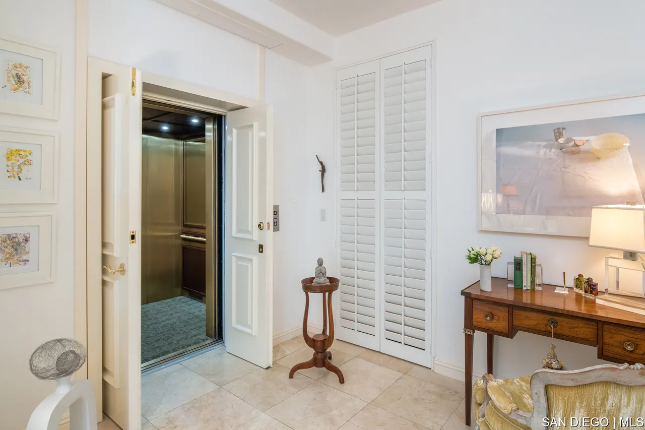 464 Prospect Street, Unit PH5 La Jolla, CA 92037 - Photo 8 of 28 a bathroom with a sink and shower