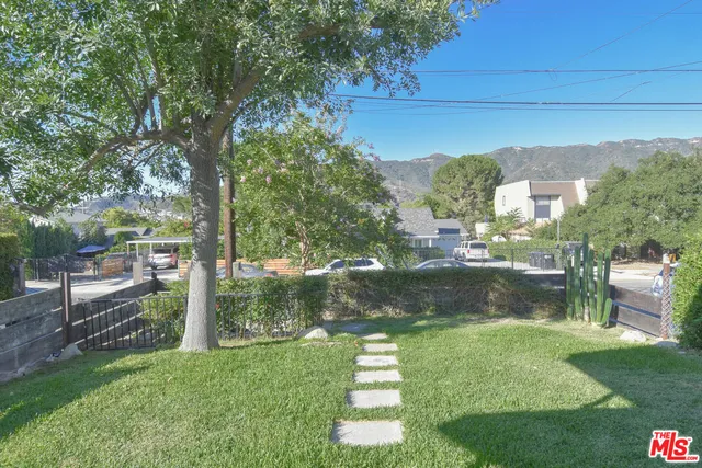 a view of a porch with a yard