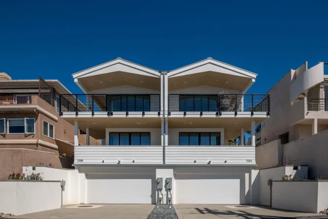 a front view of a house with balcony