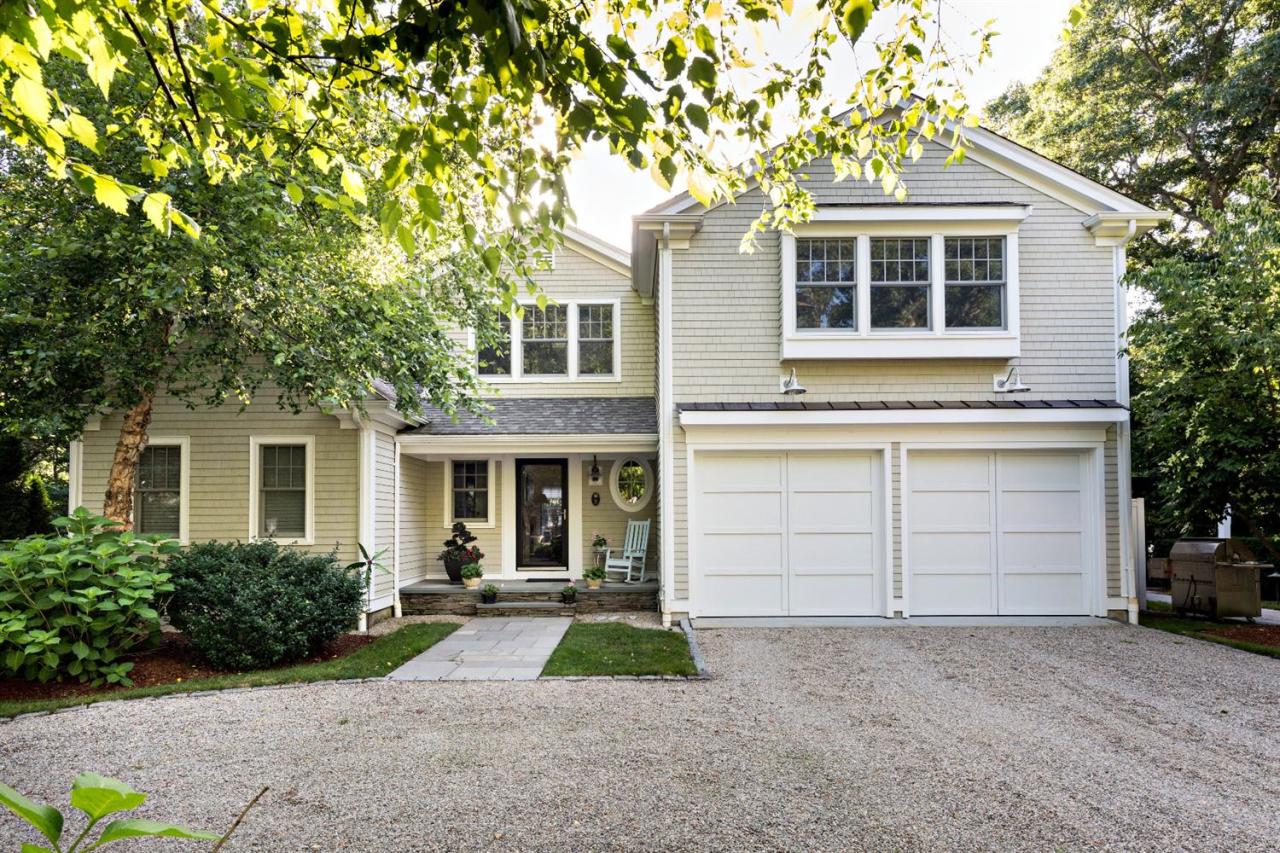 5 Uncatena Road Mashpee, MA 02649 - Photo 1 of 29 front view of a house with a yard