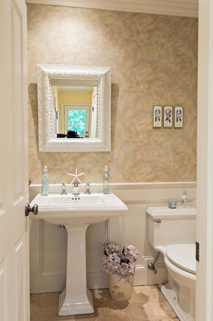 5 Uncatena Road Mashpee, MA 02649 - Photo 27 of 29 a bathroom with a sink toilet and mirror
