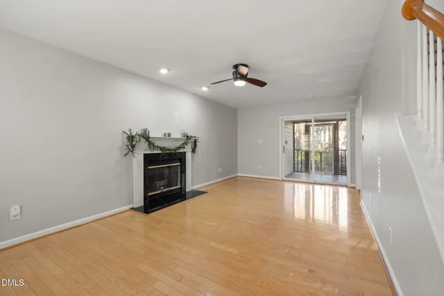 a large kitchen with granite countertop a large counter top stainless steel appliances and cabinets