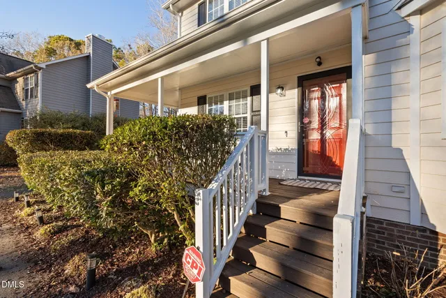 a view of a balcony with wooden floor