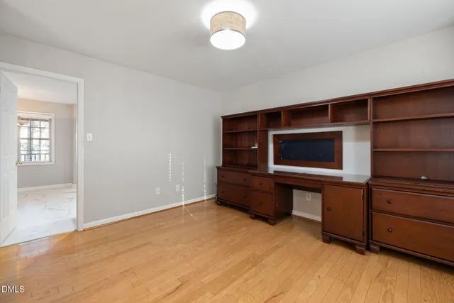 a bedroom with a bed and closet