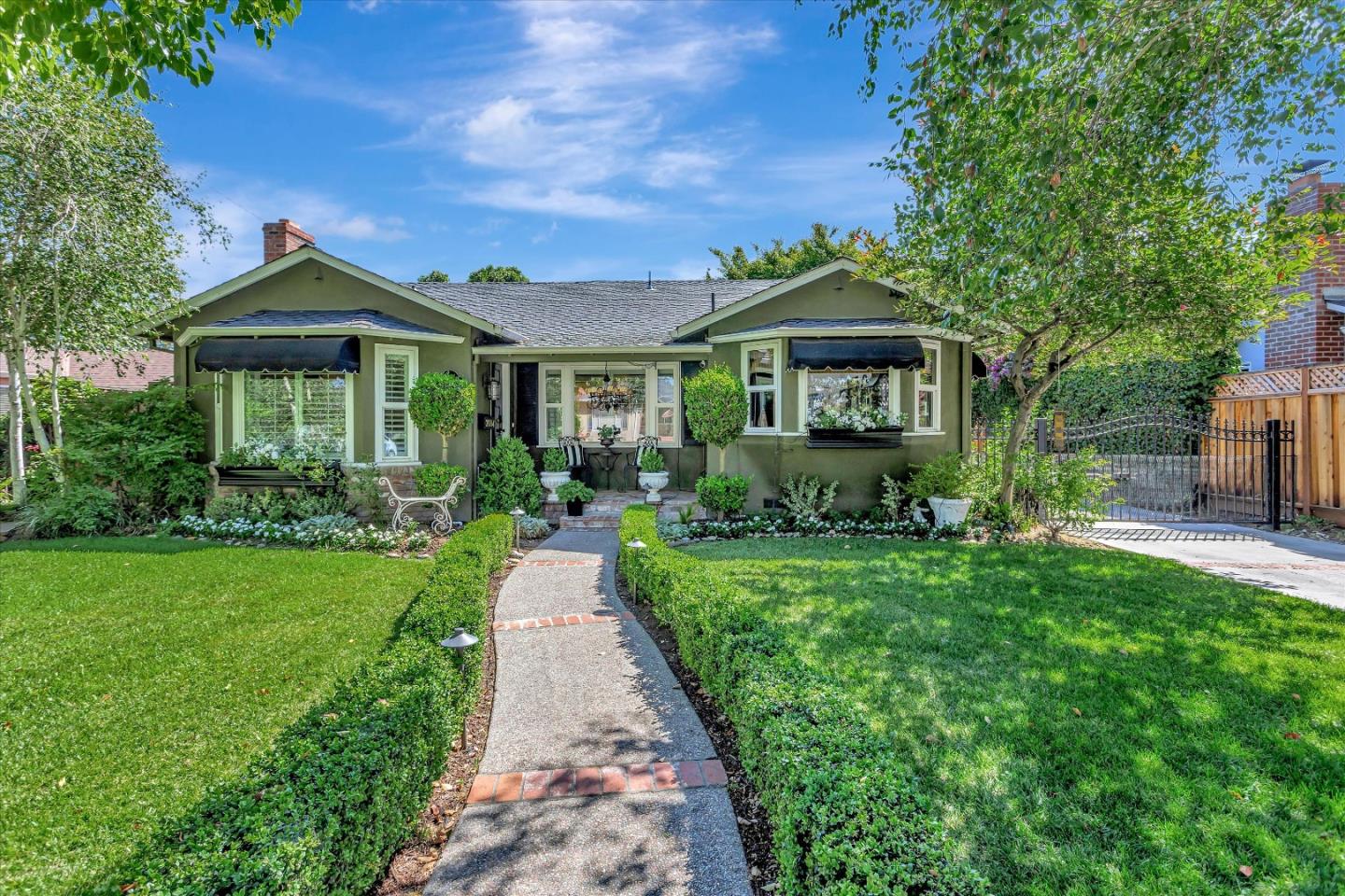 2084 Ellen Avenue San Jose, CA 95125 - Photo 1 of 43 a front view of a house with a yard