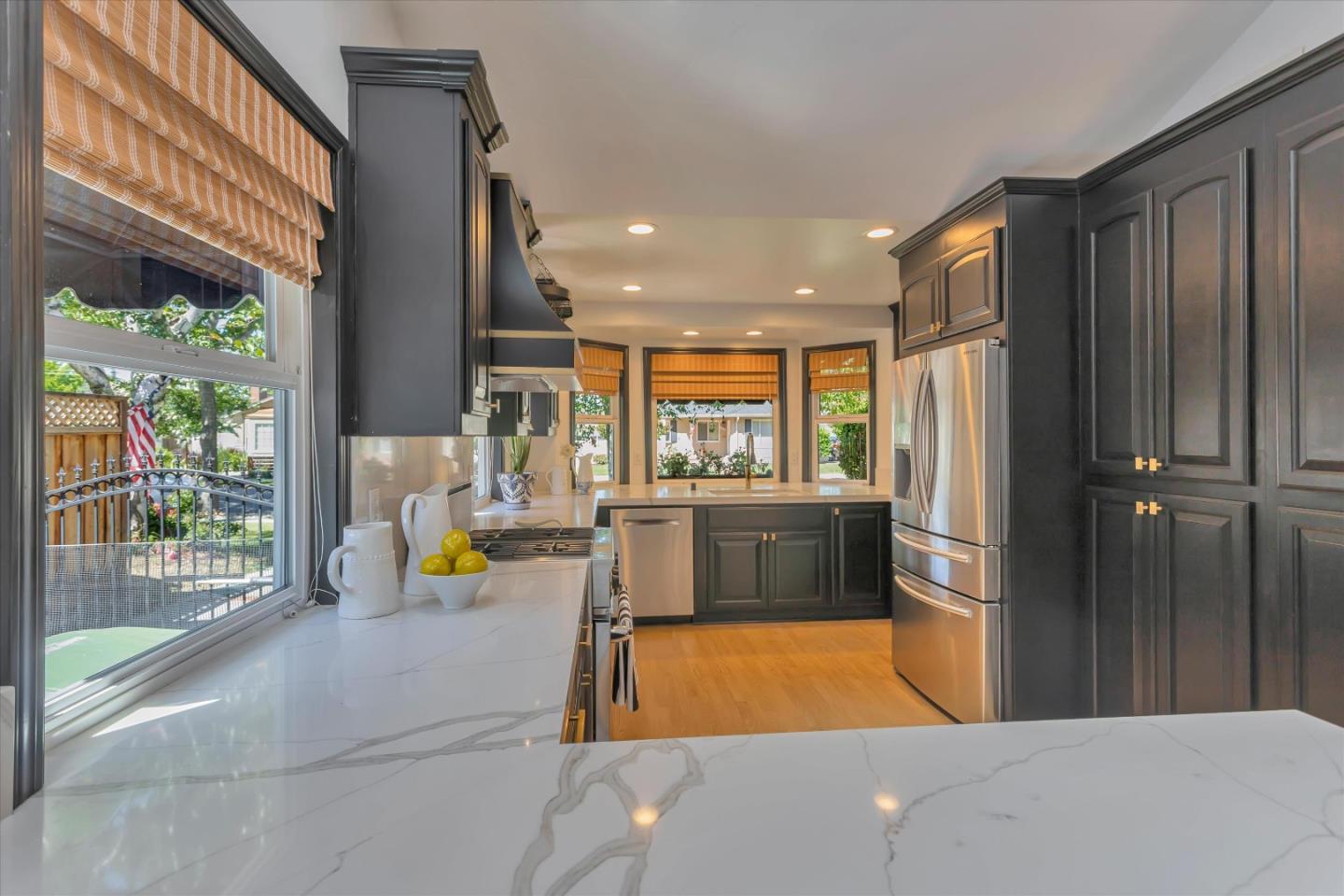 2084 Ellen Avenue San Jose, CA 95125 - Photo 11 of 43 a bathroom with a tub sink and large window