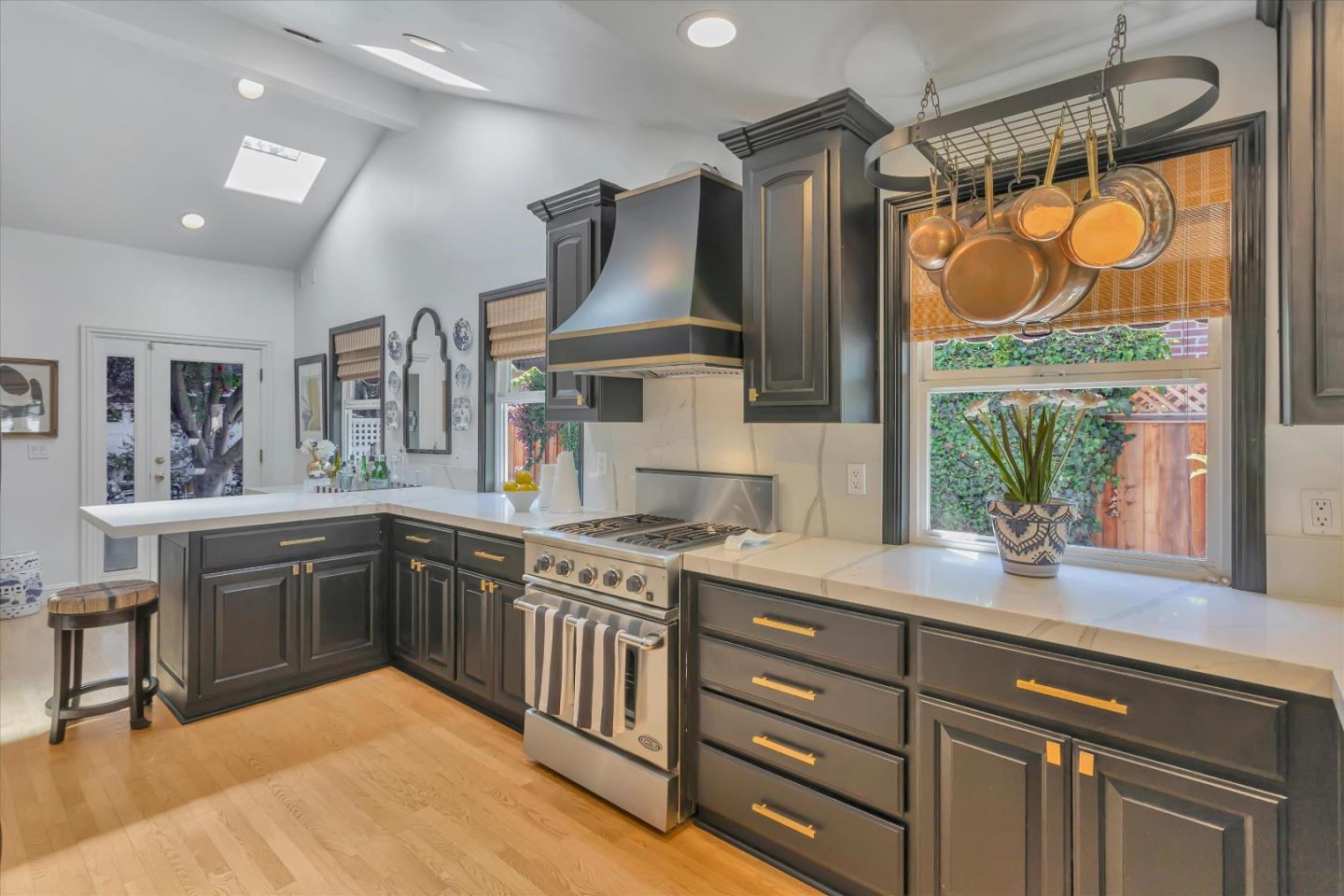 2084 Ellen Avenue San Jose, CA 95125 - Photo 12 of 43 a kitchen with stainless steel appliances granite countertop a sink a stove and a wooden floors