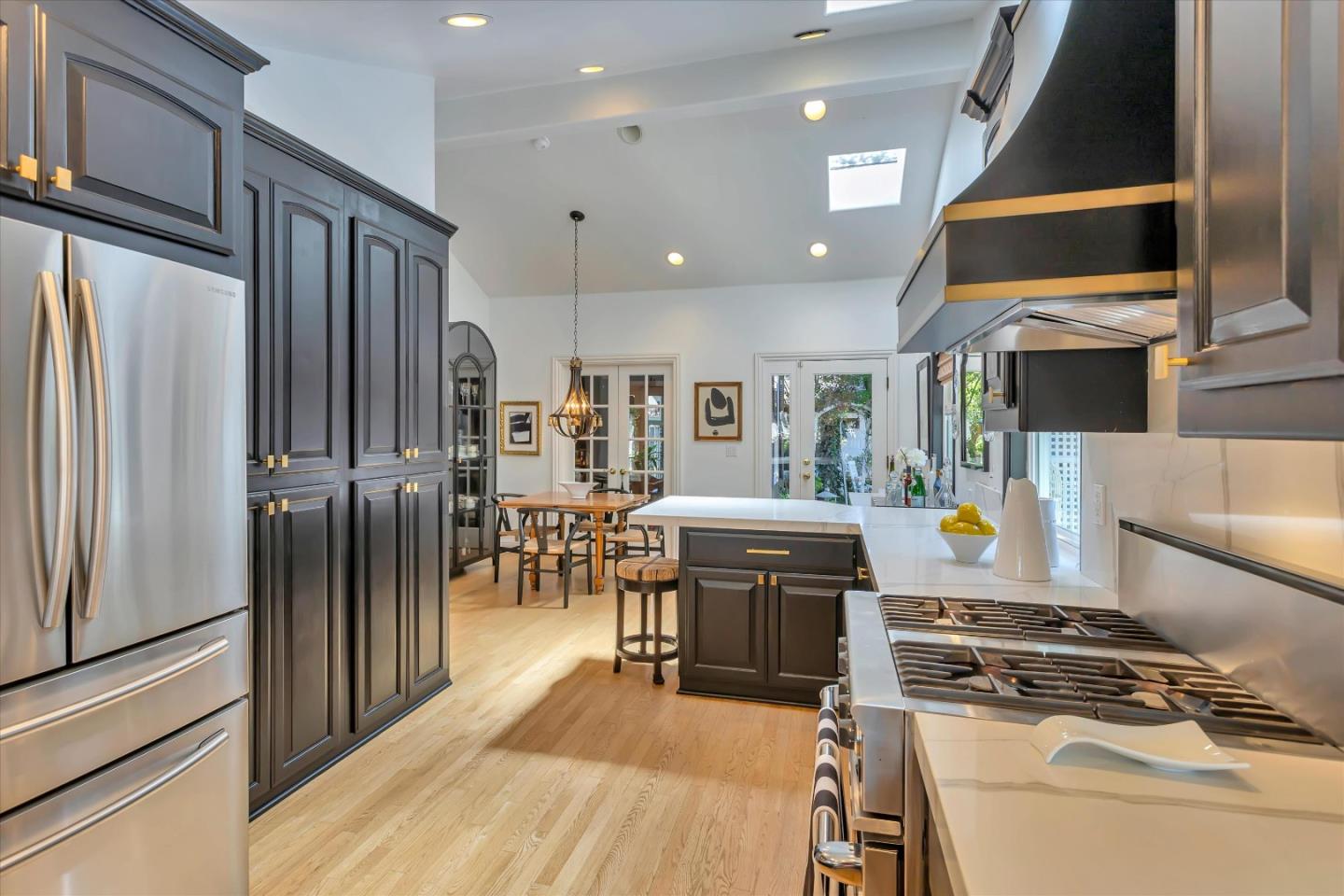 2084 Ellen Avenue San Jose, CA 95125 - Photo 13 of 43 a kitchen with stainless steel appliances granite countertop a stove and a refrigerator