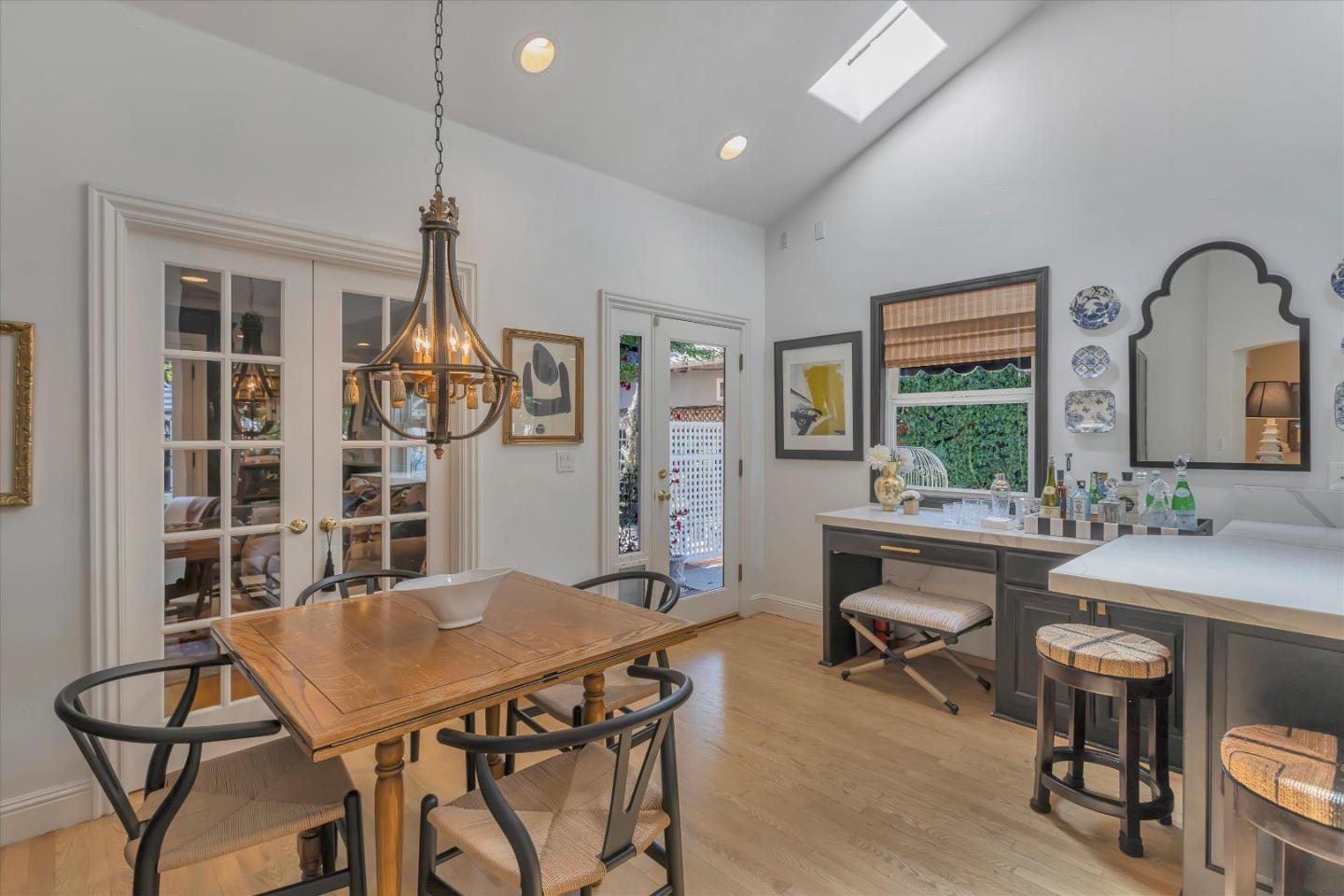 2084 Ellen Avenue San Jose, CA 95125 - Photo 14 of 43 a view of a dining room with furniture window and wooden floor
