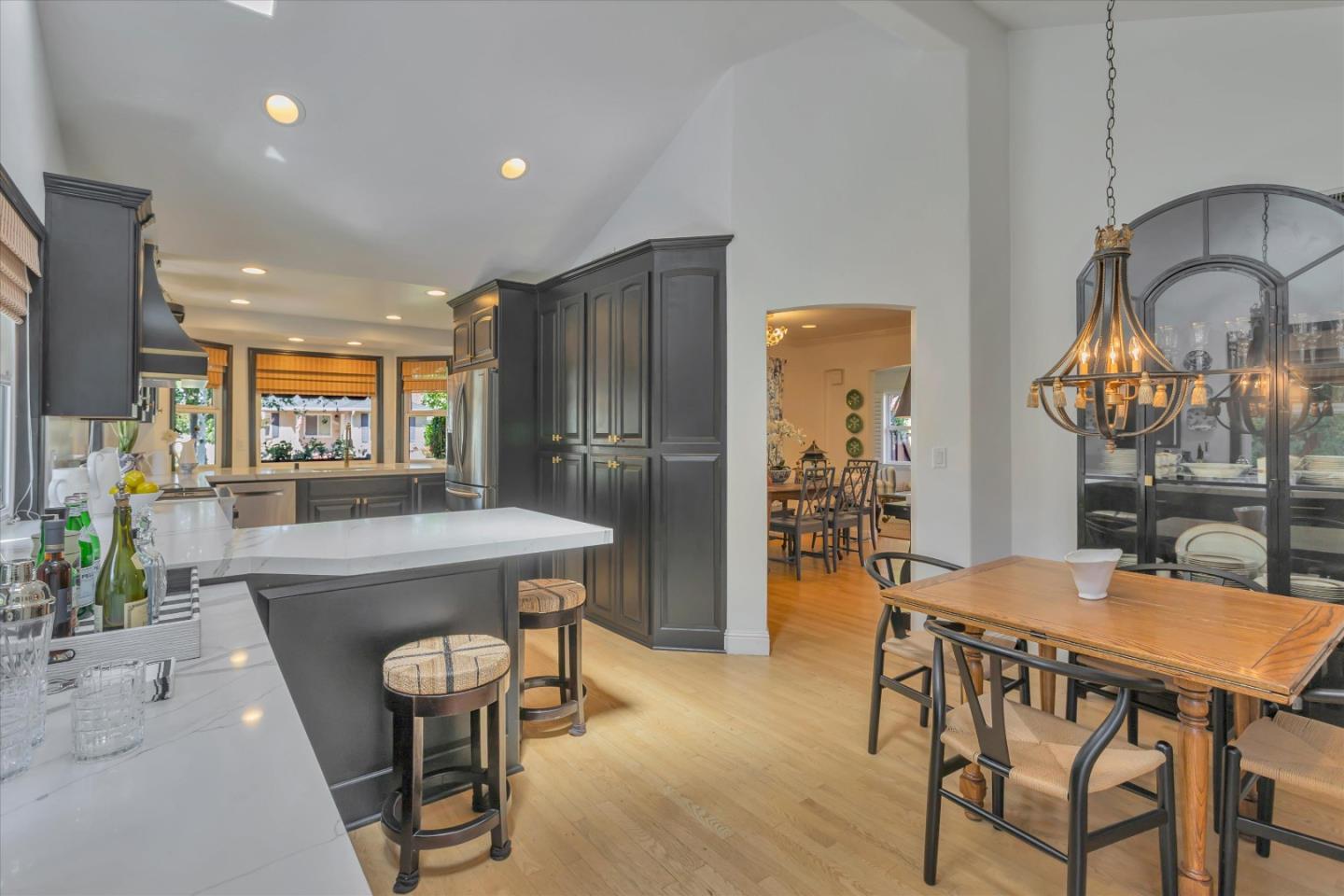 2084 Ellen Avenue San Jose, CA 95125 - Photo 15 of 43 a dining hall with stainless steel appliances granite countertop a dining table and chairs