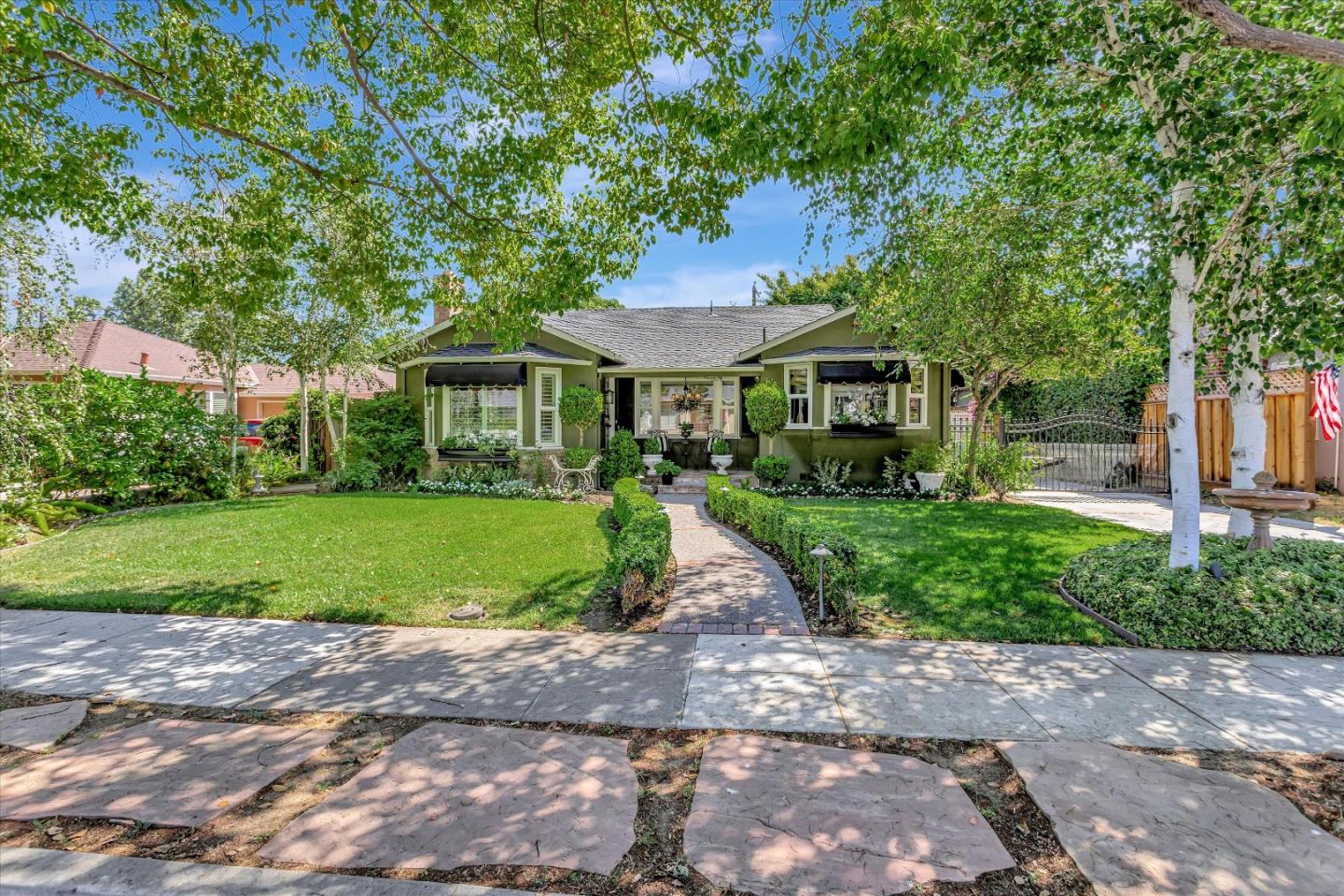 2084 Ellen Avenue San Jose, CA 95125 - Photo 2 of 43 a front view of a house with a yard