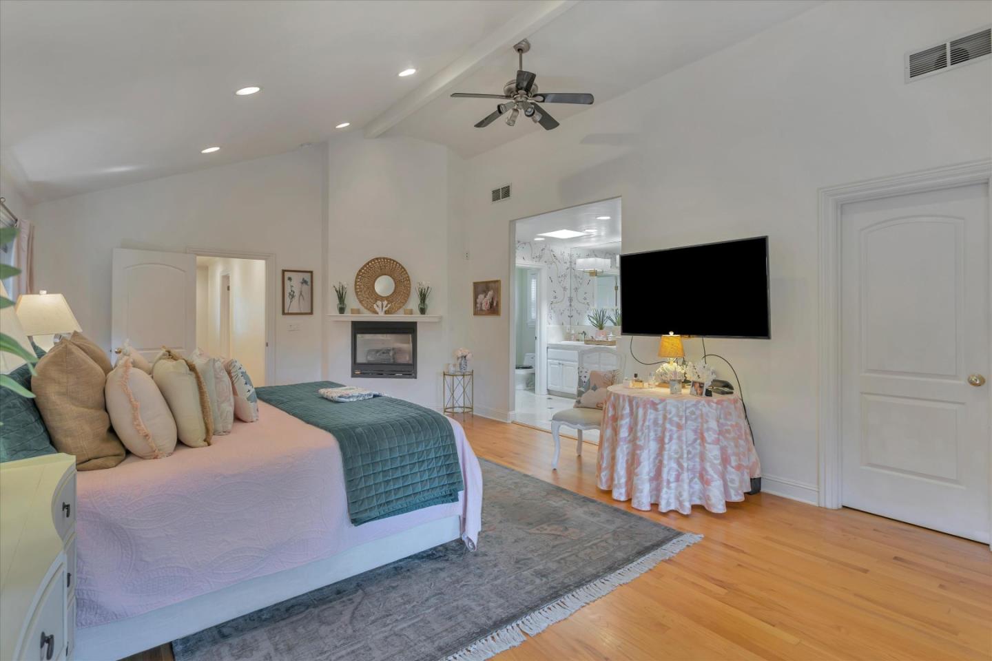 2084 Ellen Avenue San Jose, CA 95125 - Photo 26 of 43 a spacious bedroom with a bed and a flat screen tv