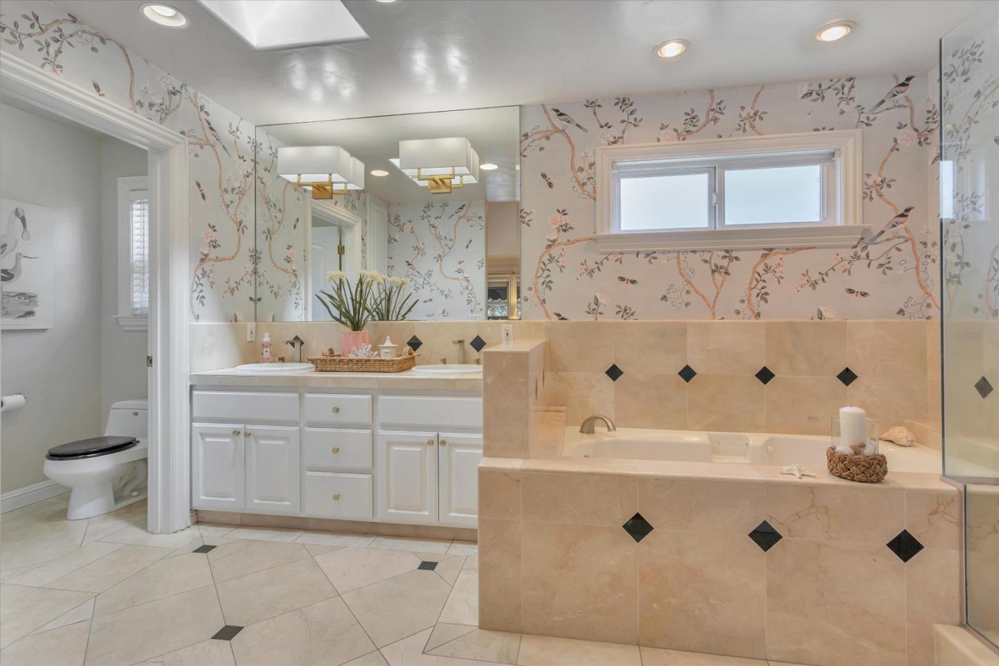 2084 Ellen Avenue San Jose, CA 95125 - Photo 31 of 43 a bathroom with a double vanity sink mirror and shower