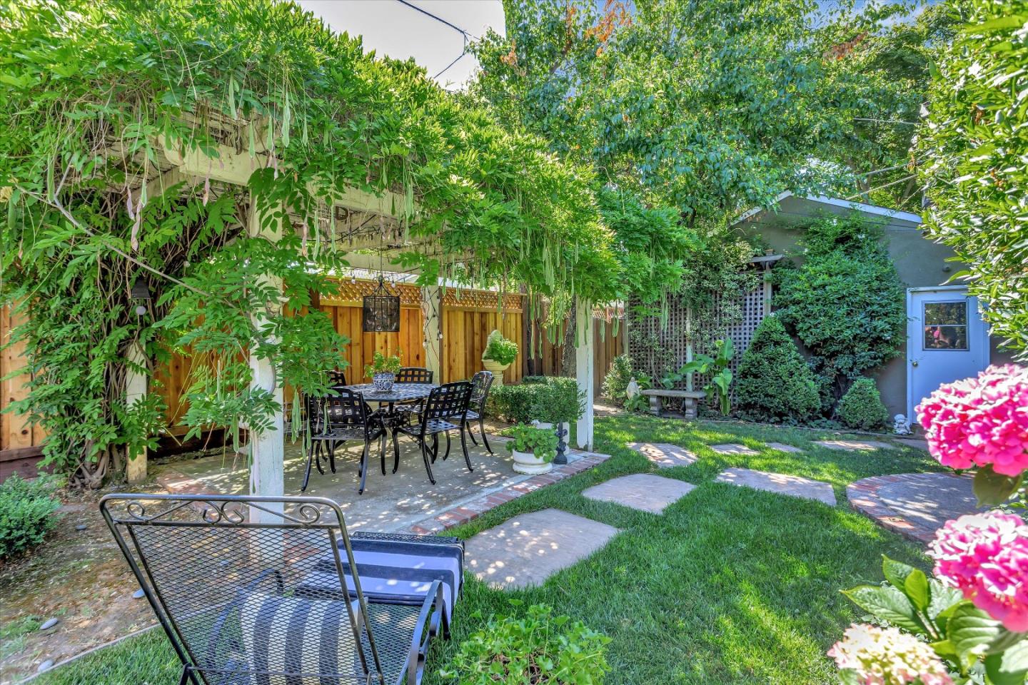 2084 Ellen Avenue San Jose, CA 95125 - Photo 36 of 43 a view of a table and chairs in patio of a house