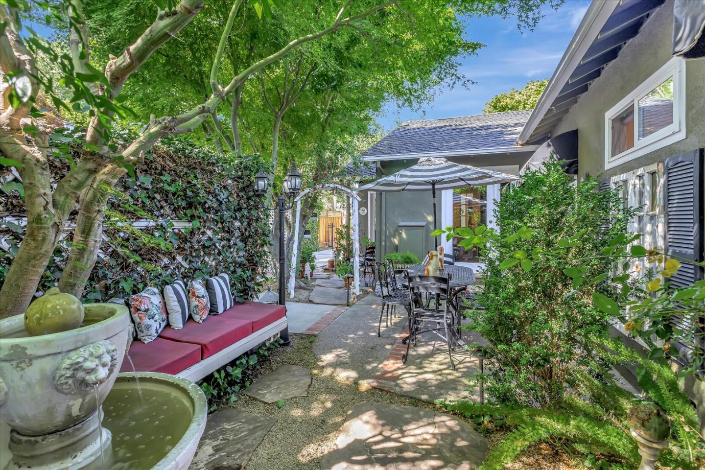 2084 Ellen Avenue San Jose, CA 95125 - Photo 38 of 43 a view of a patio with couches table and chairs and potted plants