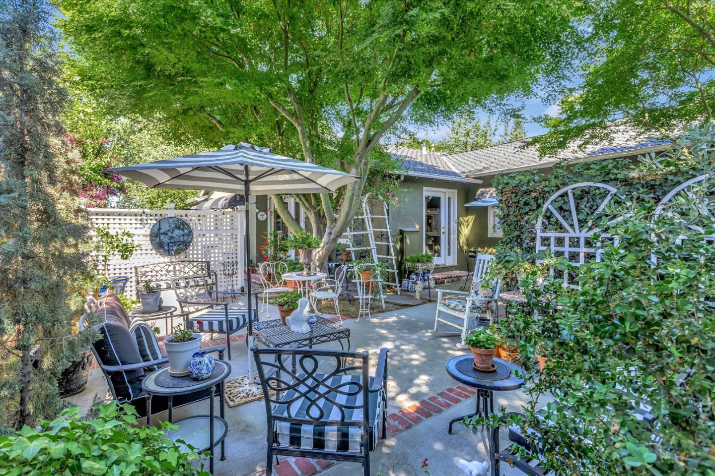 2084 Ellen Avenue San Jose, CA 95125 - Photo 41 of 43 a view of a patio with furniture and a garden