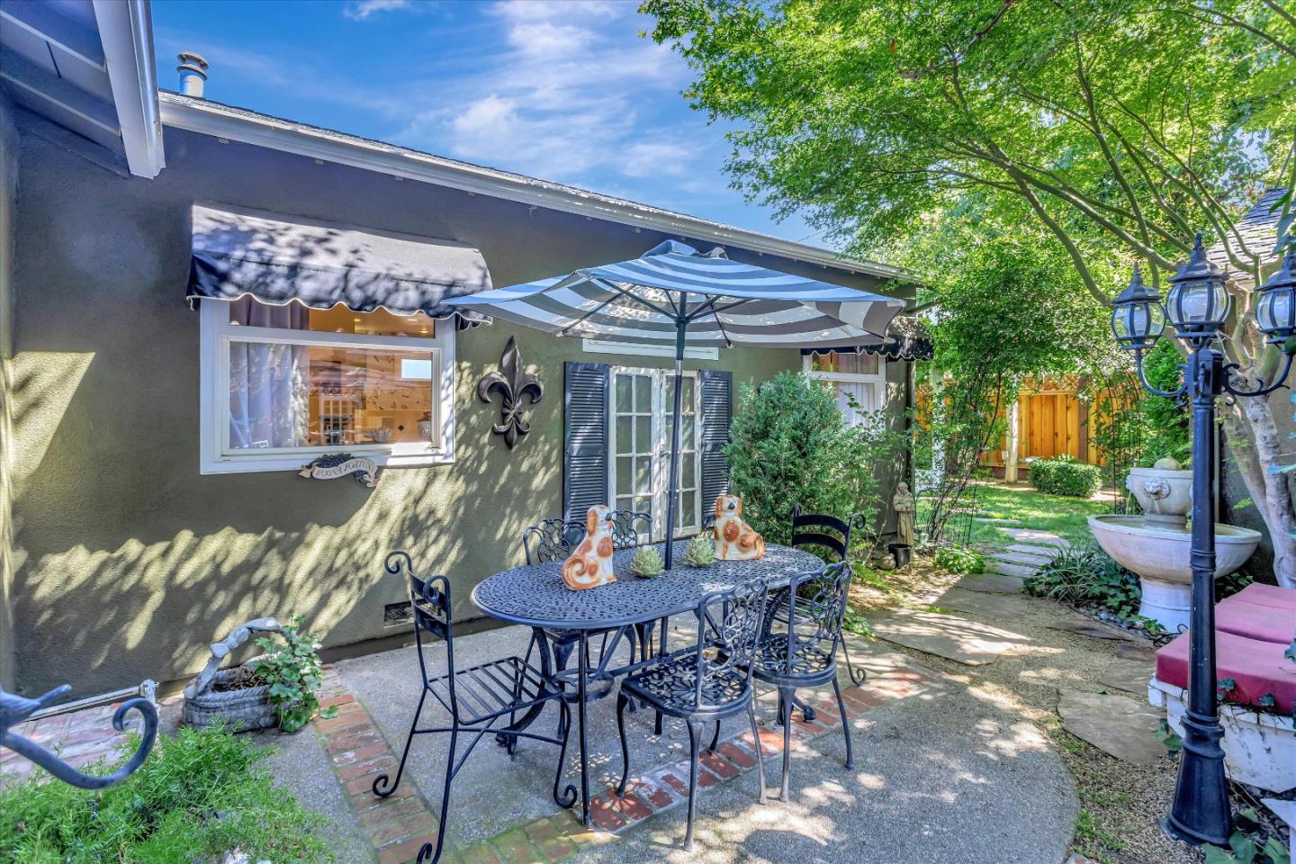 2084 Ellen Avenue San Jose, CA 95125 - Photo 43 of 43 a view of a patio with a table and chairs