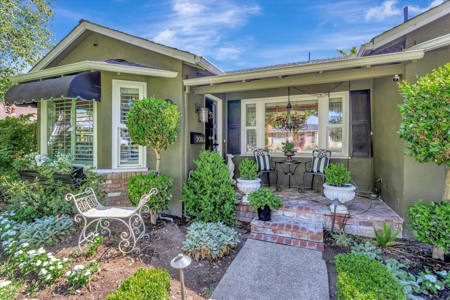 2084 Ellen Avenue San Jose, CA 95125 - Photo 5 of 43 a front view of a house with garden