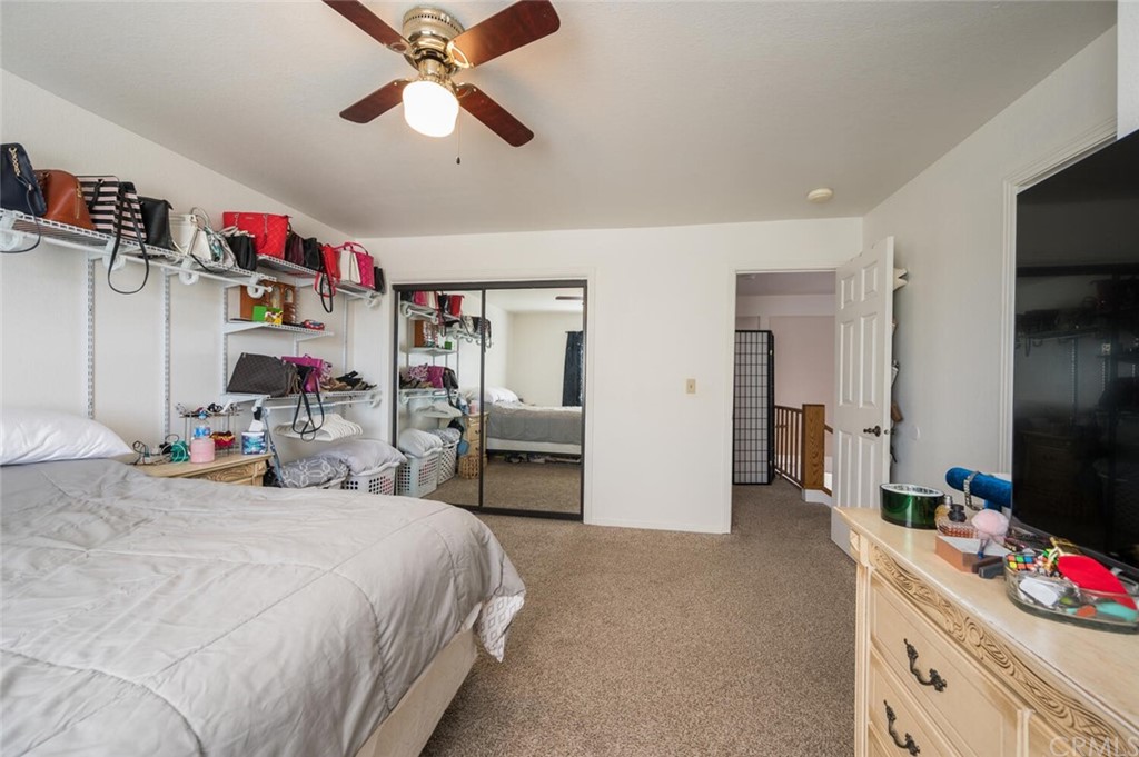 41 Brewer Street Templeton, CA 93465 - Photo 12 of 57 a bedroom with furniture and a flat screen tv