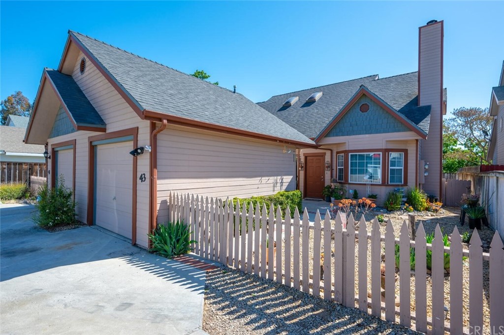 41 Brewer Street Templeton, CA 93465 - Photo 22 of 57 a front view of house with wooden fence