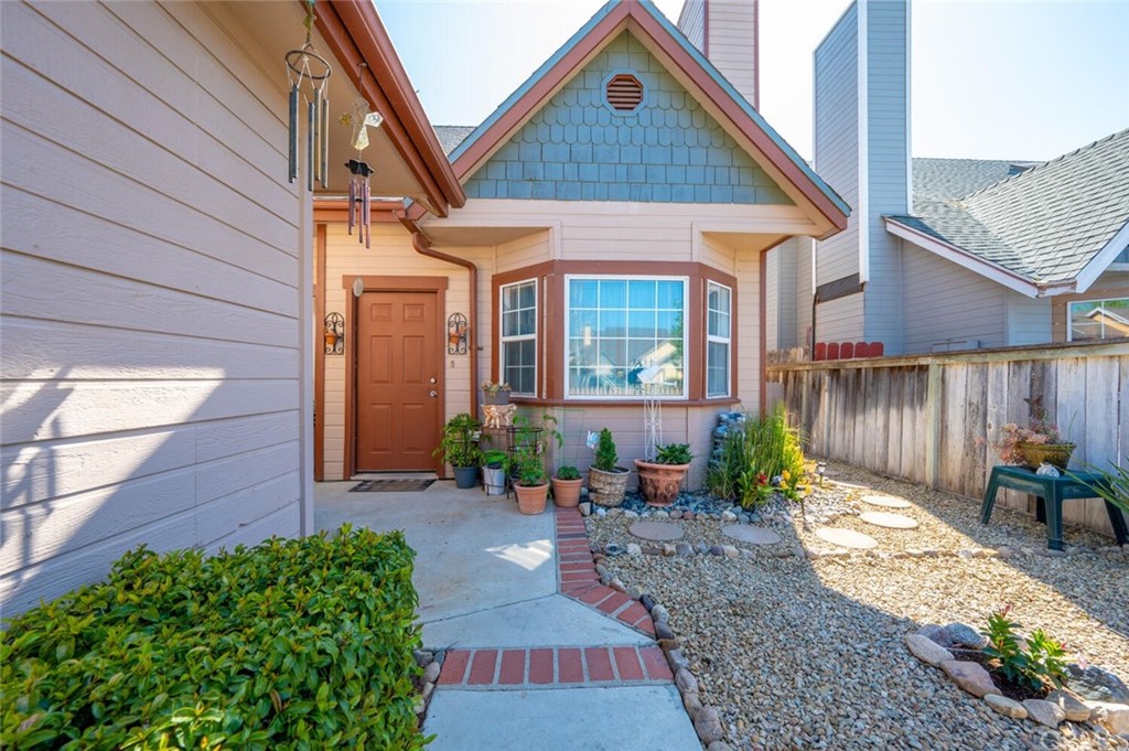 41 Brewer Street Templeton, CA 93465 - Photo 24 of 57 a view of a house with wooden walls and potted plants