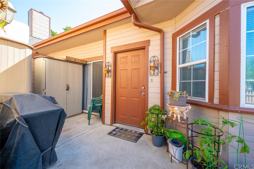 41 Brewer Street Templeton, CA 93465 - Photo 25 of 57 a backyard of a house with potted plants