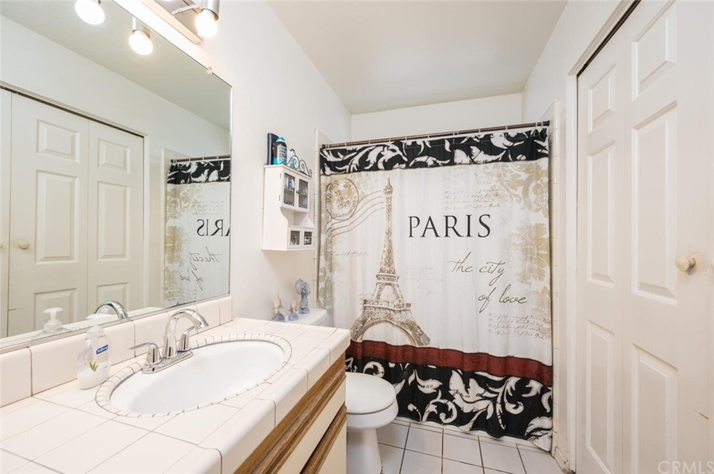 41 Brewer Street Templeton, CA 93465 - Photo 35 of 57 a bathroom with a sink and a mirror