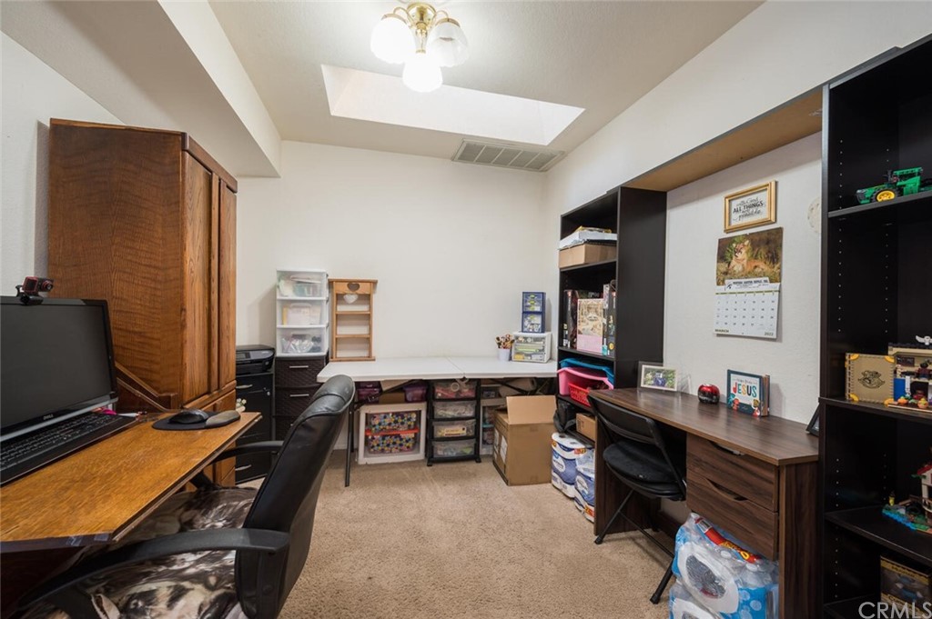 41 Brewer Street Templeton, CA 93465 - Photo 37 of 57 a room with furniture and flat screen tv