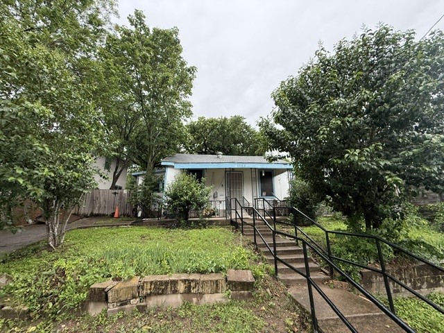 1702 Perez Street Austin, TX 78721 - Photo 1 of 17 a house view with a garden space