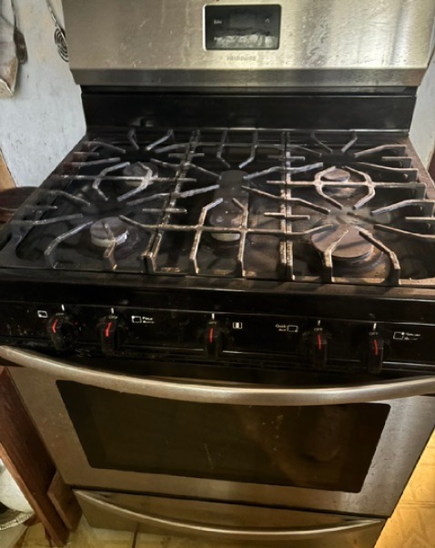 1702 Perez Street Austin, TX 78721 - Photo 15 of 17 a close view of stove