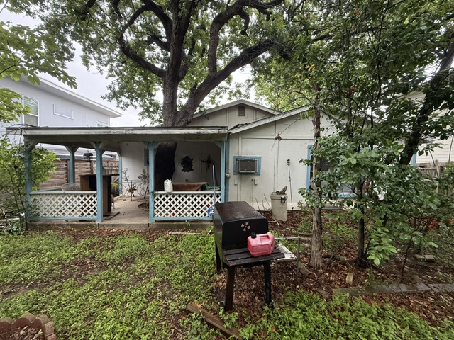 1702 Perez Street Austin, TX 78721 - Photo 8 of 17 a front view of a house with garden