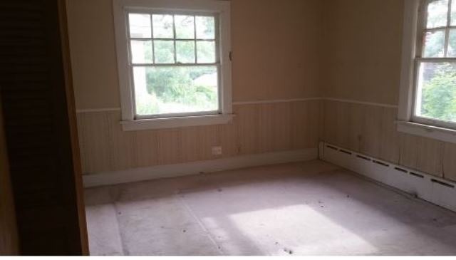 922 North Spring Street Elgin, IL 60120 - Photo 11 of 11 an empty room with a window