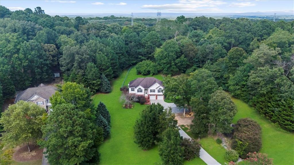 297 Orchard Way Southeast Calhoun, GA 30701 - Photo 1 of 1 an aerial view of a golf course with parking space