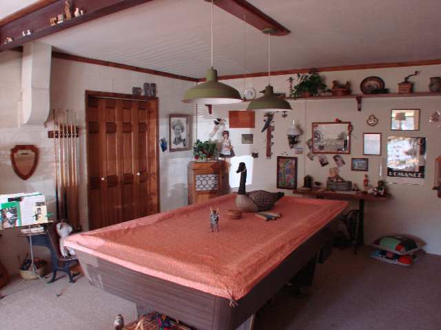 3041 Aspen Road Overgaard, AZ 85933 - Photo 5 of 5 a dining table & chairs in a room