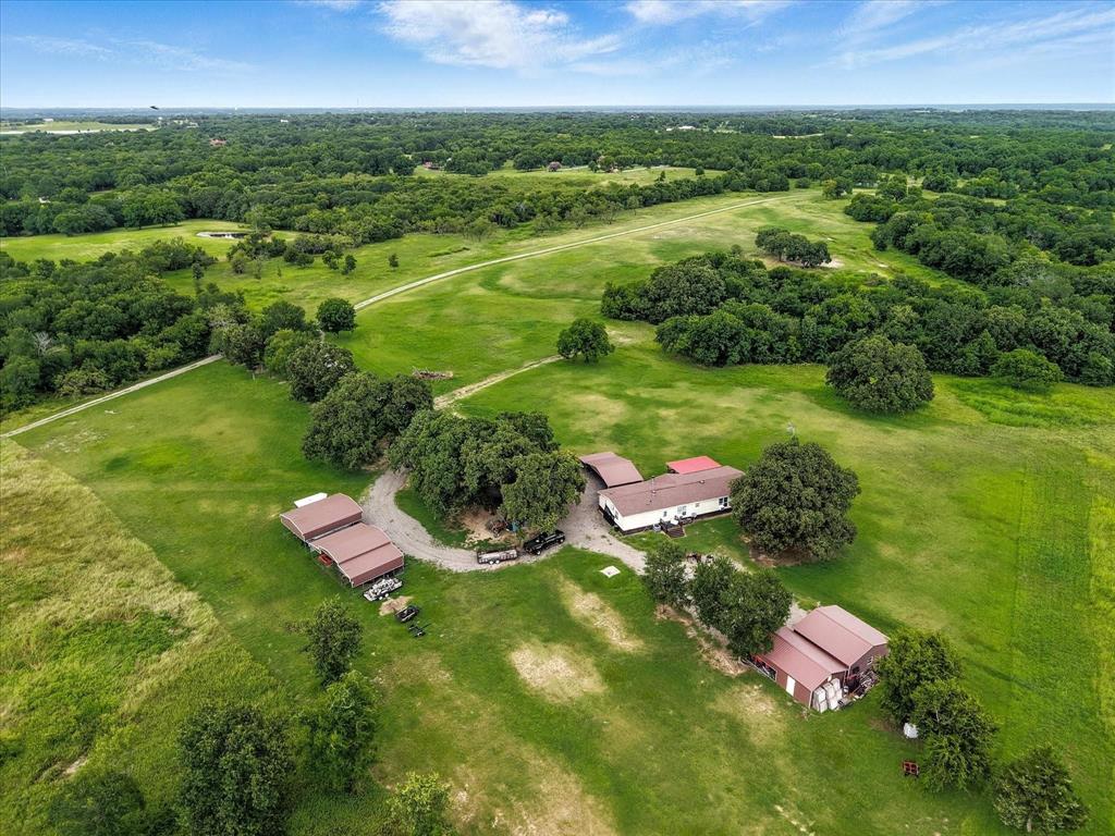 1148 Union Hill Road Ennis, TX 75119 - Photo 3 of 10 a view of a lake with a yard
