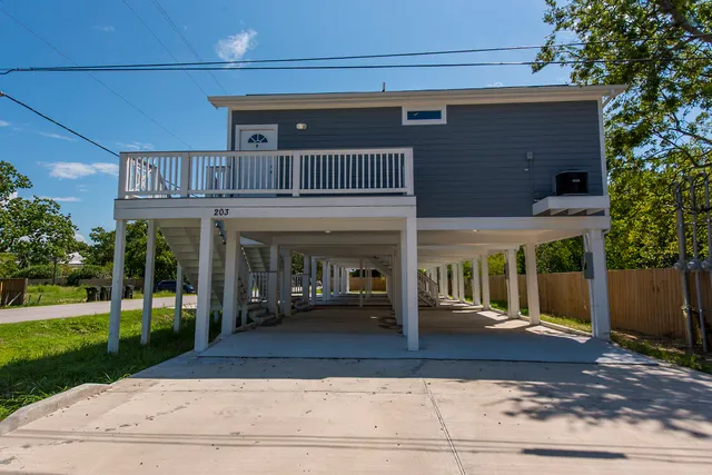 a view of an empty room with a balcony
