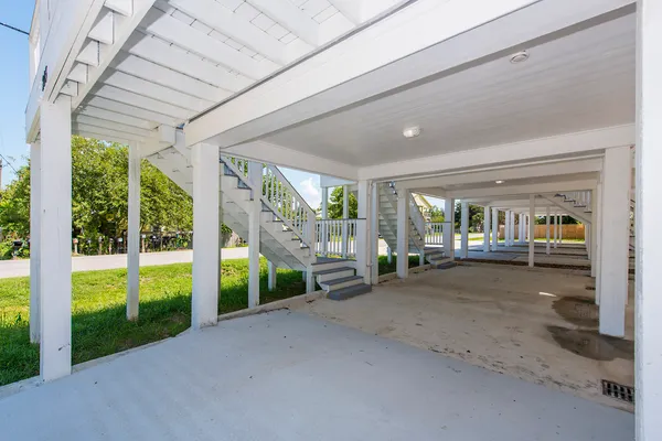 a view of outdoor space and wooden deck
