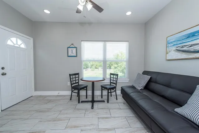 a utility room with sink dryer and washer