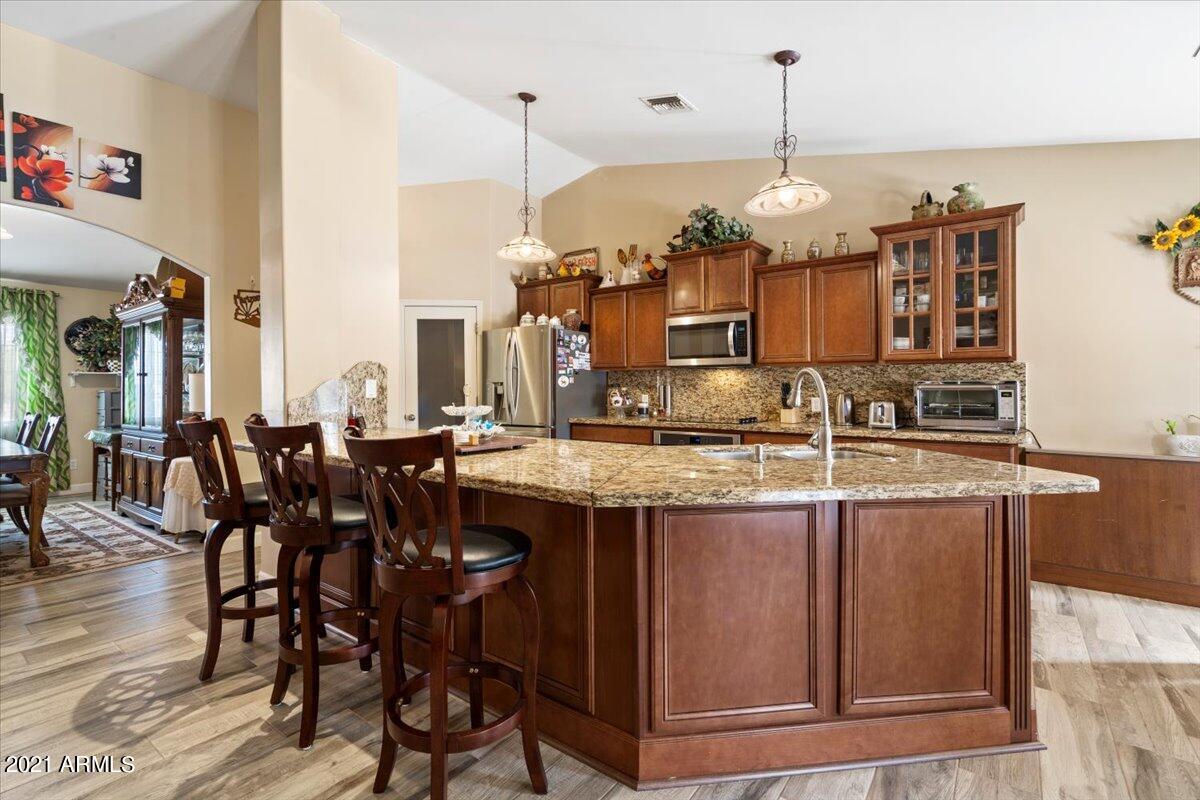2735 West Canyon Road Phoenix, AZ 85086 - Photo 8 of 36 08-Kitchen w_ Breakfast Bar