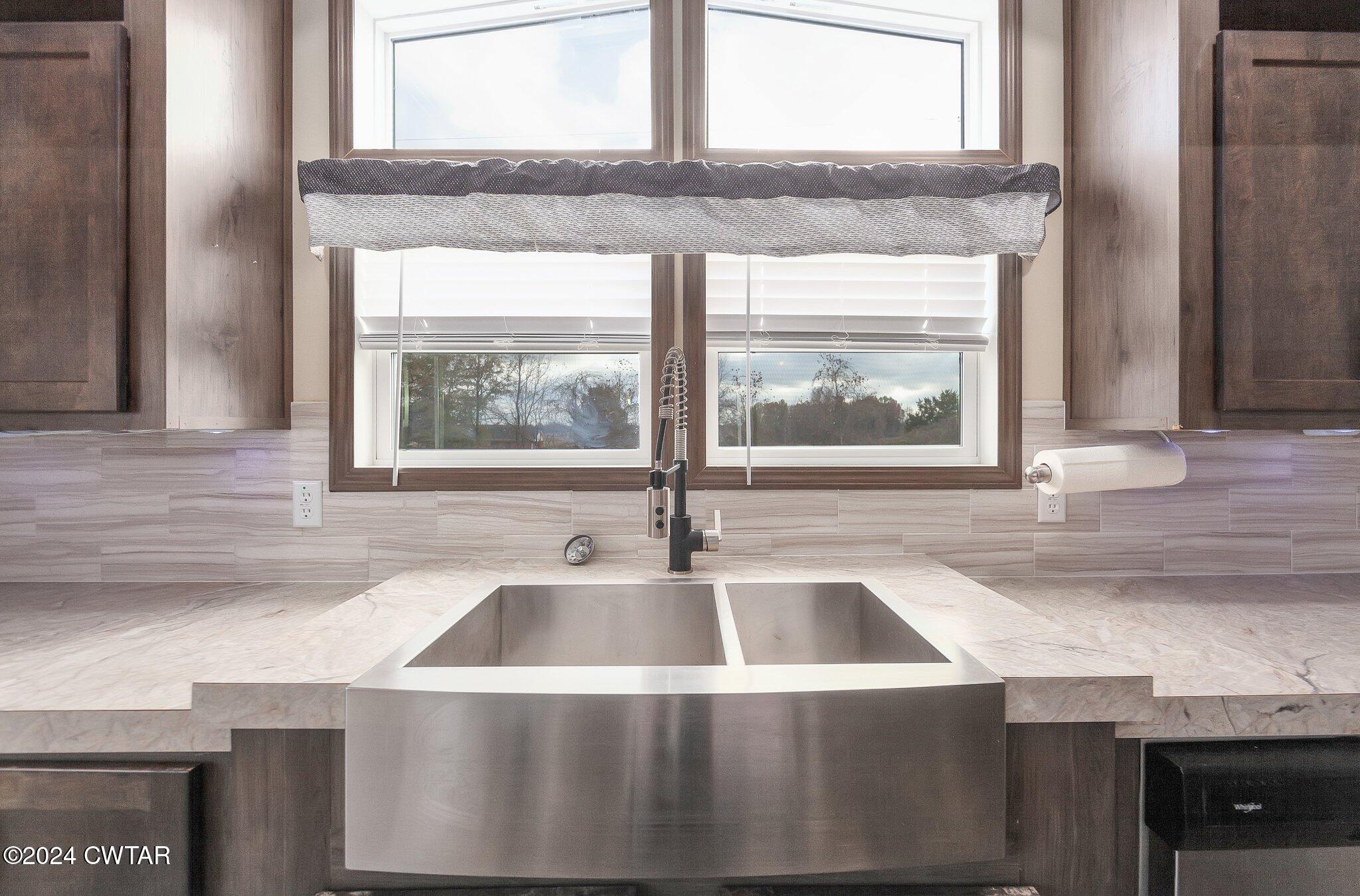 386 Bond Cemetery Road Denmark, TN 38391 - Photo 13 of 40 a kitchen with a sink and a window