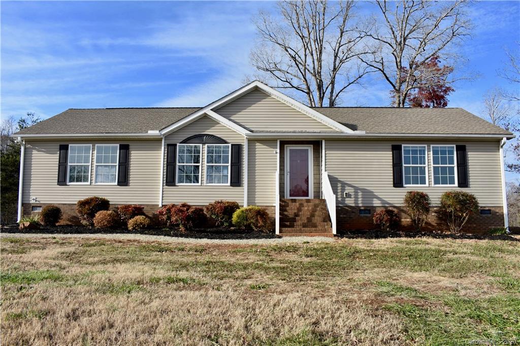 498 Ted Smith Road Rutherfordton, NC 28139 - Photo 1 of 38 a front view of a house with a yard