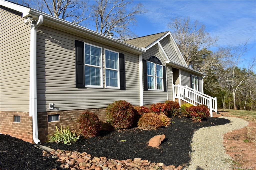 498 Ted Smith Road Rutherfordton, NC 28139 - Photo 2 of 38 a view of a house with a yard