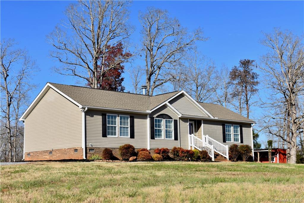 498 Ted Smith Road Rutherfordton, NC 28139 - Photo 3 of 38 a front view of a house with a yard