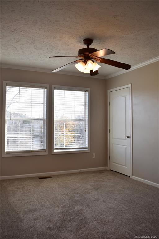 498 Ted Smith Road Rutherfordton, NC 28139 - Photo 22 of 38 a view of an empty room with a window