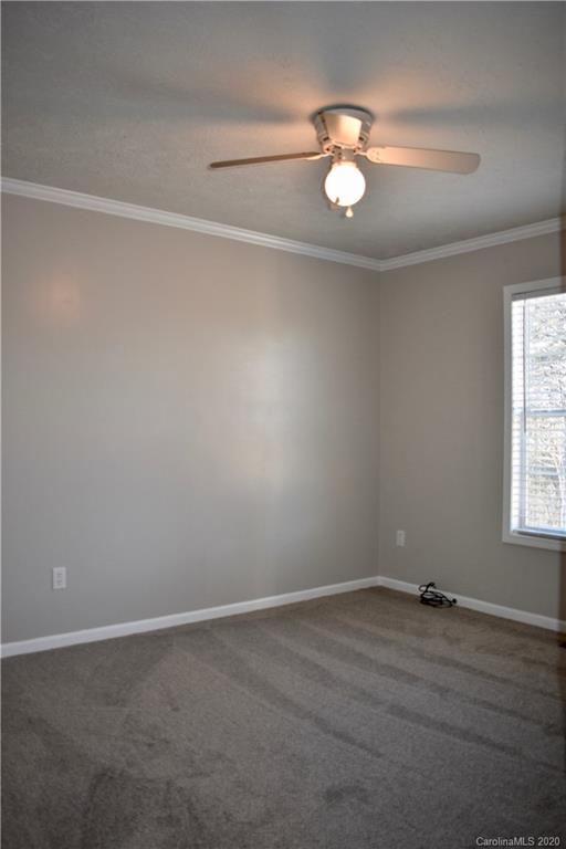 498 Ted Smith Road Rutherfordton, NC 28139 - Photo 23 of 38 a view of an empty room with a window