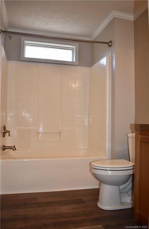 498 Ted Smith Road Rutherfordton, NC 28139 - Photo 24 of 38 a bathroom with a toilet and a shower